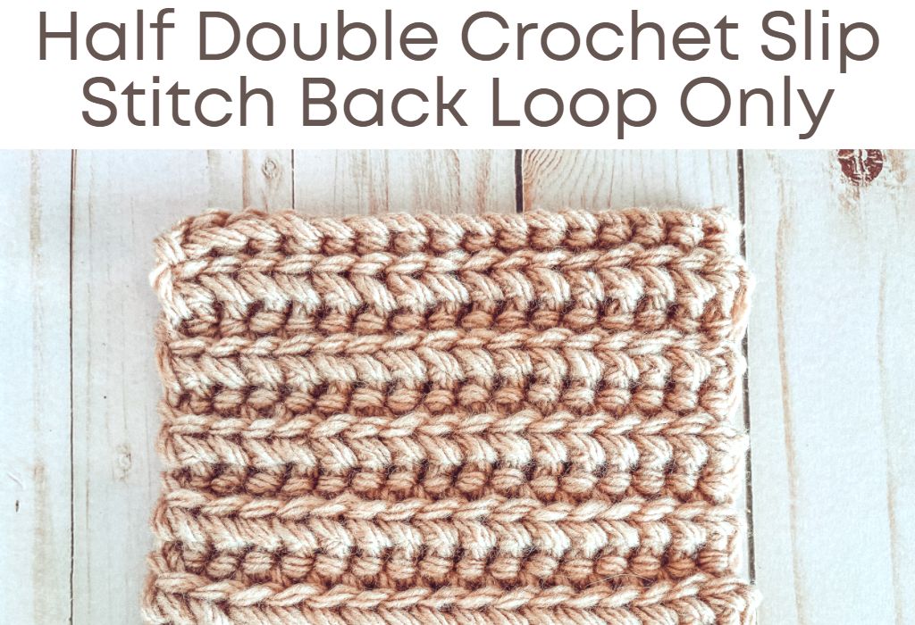 A crochet swatch of the half double crochet slip stitch in the back loop only in beige yarn is on a wood background. Text at the top says "Half Double Crochet Slip Stitch Back Loop Only"